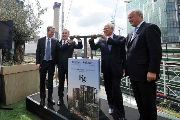 Marland (right) poses with Najib at the Battersea development May 2016