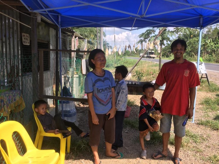 Eager for work - local kampung folk are already expert in rearing local trees